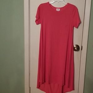 Salmon colored LulaRoe polyester dress.